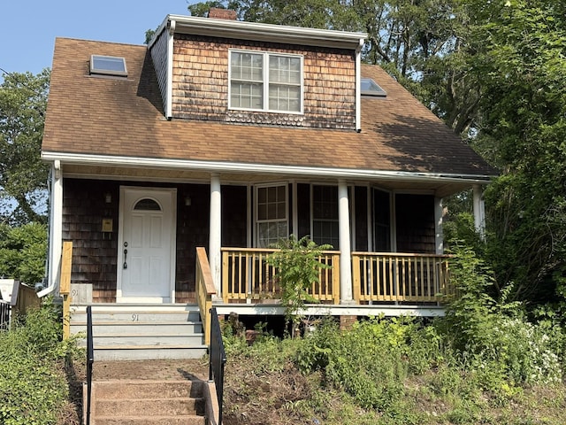 91 Hyde St, New Haven, CT 06512 - view of front facade with a porch, a chimney, and roof with shingles