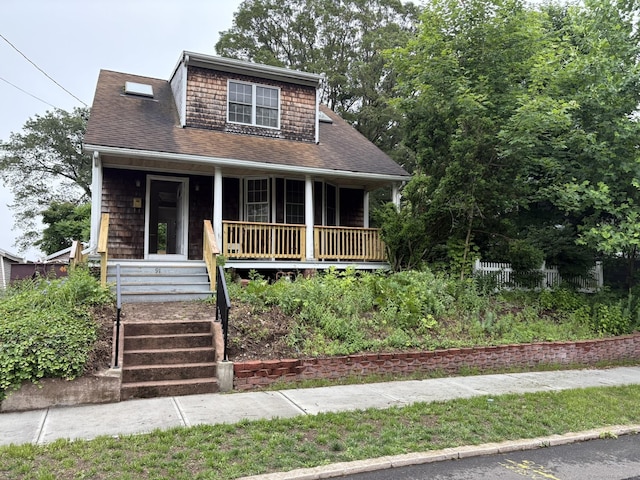 91 Hyde St, New Haven, CT 06512 - view of front of home featuring covered porch and roof with shingles