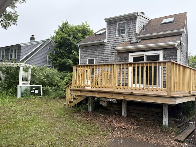 91 Hyde St, New Haven, CT 06512 - rear view of house featuring a shingled roof and a wooden deck