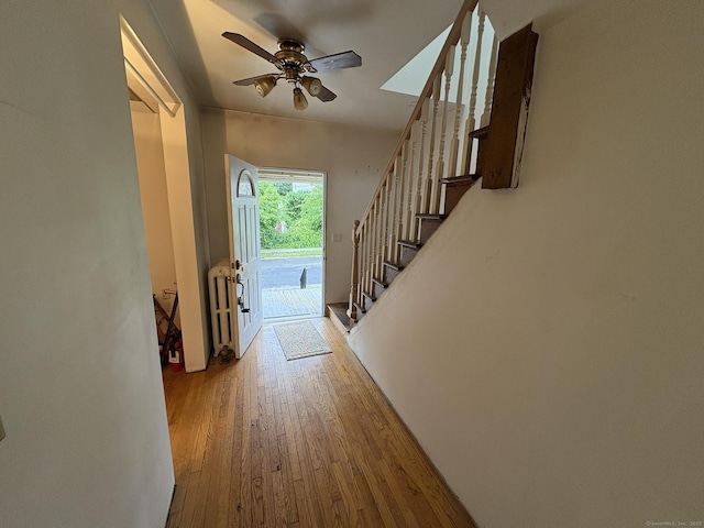 91 Hyde St, New Haven, CT 06512 - entrance foyer with ceiling fan, wood finished floors, and stairway