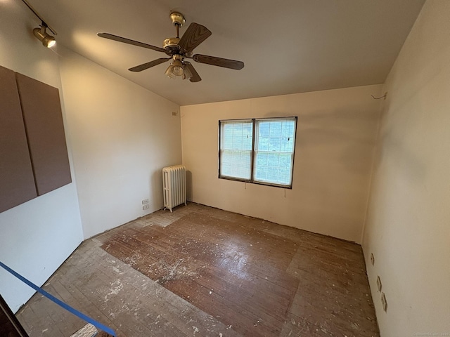 91 Hyde St, New Haven, CT 06512 - unfurnished room with radiator heating unit, lofted ceiling, and ceiling fan