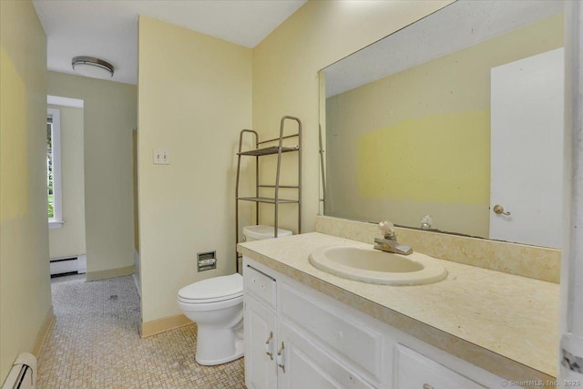 401 Berlin St, Southington, CT 06489 - bathroom with a baseboard radiator, vanity, and tile patterned flooring