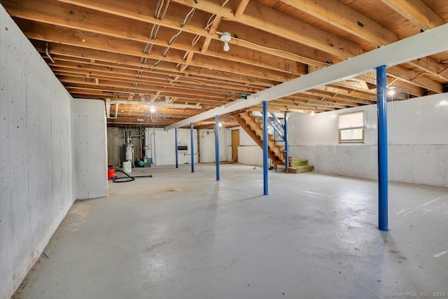 401 Berlin St, Southington, CT 06489 - below grade area featuring stairs and water heater