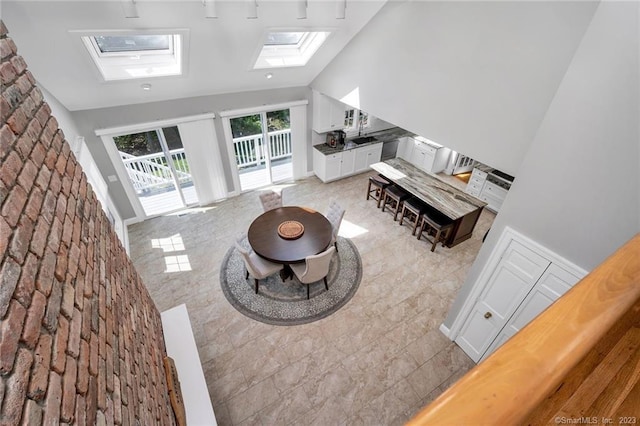 26 Ruscoe Rd, Wilton, CT 06897 - living room with a skylight and high vaulted ceiling