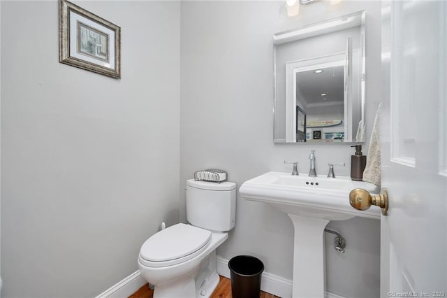 26 Ruscoe Rd, Wilton, CT 06897 - half bath featuring baseboards and wood finished floors