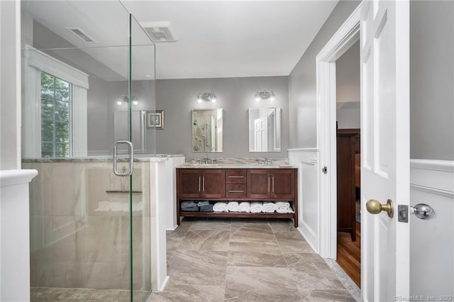 26 Ruscoe Rd, Wilton, CT 06897 - bathroom featuring double vanity, a stall shower, and marble finish flooring
