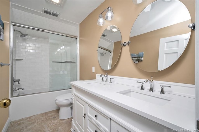 26 Ruscoe Rd, Wilton, CT 06897 - bathroom featuring double vanity and enclosed tub / shower combo
