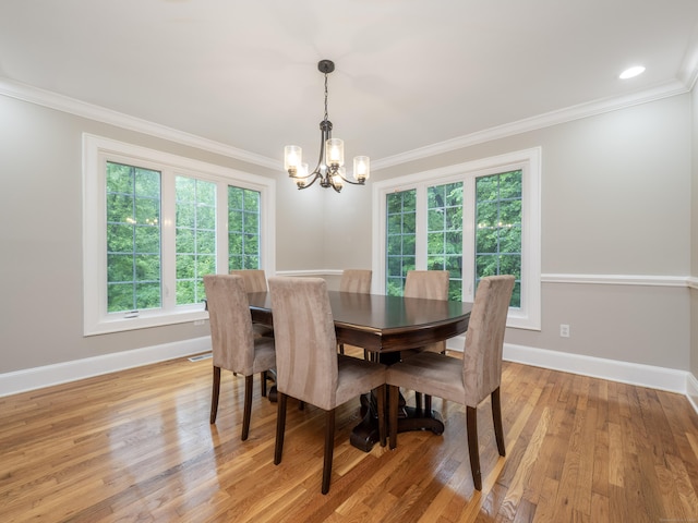 26 Ruscoe Rd, Wilton, CT 06897 - dining room featuring a chandelier, crown molding, and light wood-type flooring