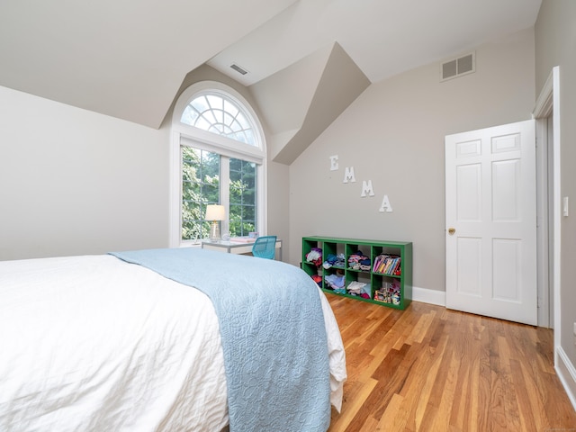 26 Ruscoe Rd, Wilton, CT 06897 - bedroom featuring light wood-style flooring and high vaulted ceiling