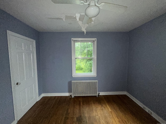 58 Eggleston St, Torrington, CT 06790 - unfurnished room with radiator, wood finished floors, and ceiling fan