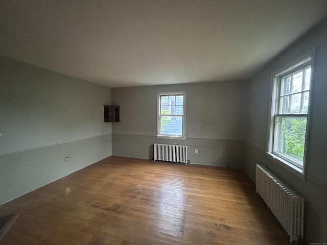 58 Eggleston St, Torrington, CT 06790 - unfurnished room featuring radiator and wood finished floors
