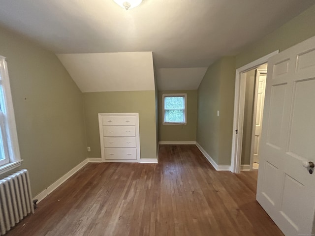 58 Eggleston St, Torrington, CT 06790 - bonus room featuring radiator heating unit, wood finished floors, and lofted ceiling