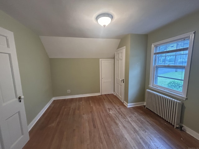 58 Eggleston St, Torrington, CT 06790 - additional living space with radiator, wood finished floors, and lofted ceiling