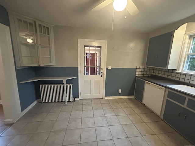 58 Eggleston St, Torrington, CT 06790 - kitchen featuring radiator, dishwasher, light tile patterned flooring, dark countertops, and a ceiling fan