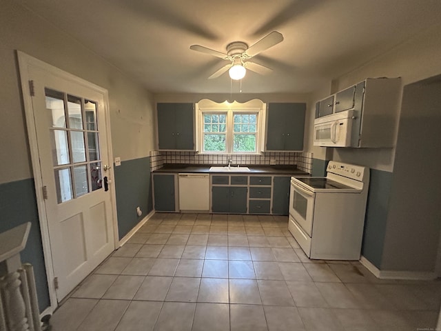 58 Eggleston St, Torrington, CT 06790 - kitchen featuring white appliances, dark countertops, backsplash, a ceiling fan, and light tile patterned floors