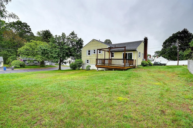 47 Hoffman Rd, Manchester, CT 06042 - rear view of property with a deck and a chimney