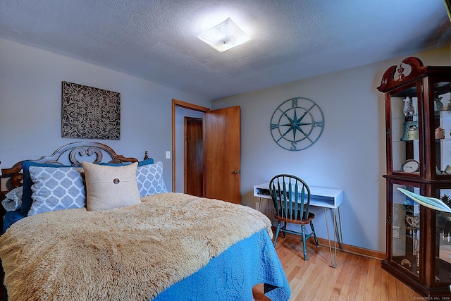 47 Hoffman Rd, Manchester, CT 06042 - bedroom with light wood-type flooring and baseboards
