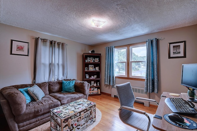 47 Hoffman Rd, Manchester, CT 06042 - home office featuring light wood-style floors and a textured ceiling