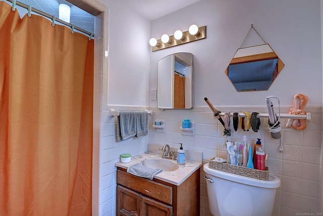 47 Hoffman Rd, Manchester, CT 06042 - bathroom featuring vanity, tile walls, a shower with shower curtain, and tasteful backsplash