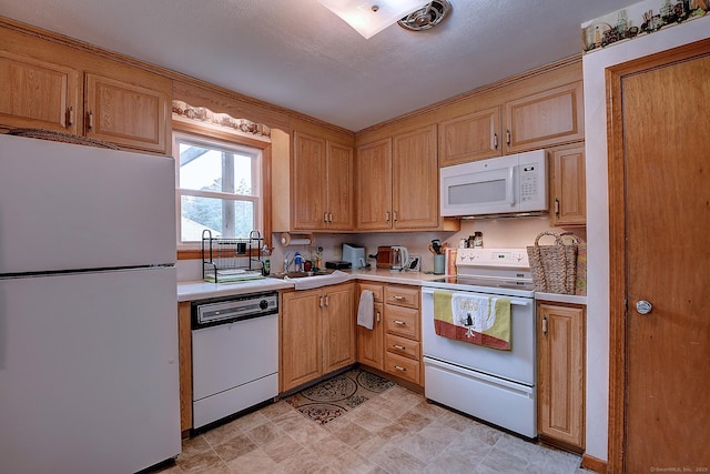 47 Hoffman Rd, Manchester, CT 06042 - kitchen featuring white appliances and light countertops