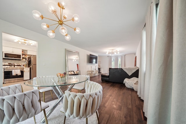 7 Derbyshire Unit 7, Derby, CT 06418 - dining space with a chandelier and dark wood-type flooring