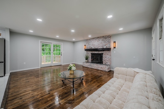 34 Roberts Rd, Marlborough, CT 06447 - living room with recessed lighting, a fireplace, and wood finished floors
