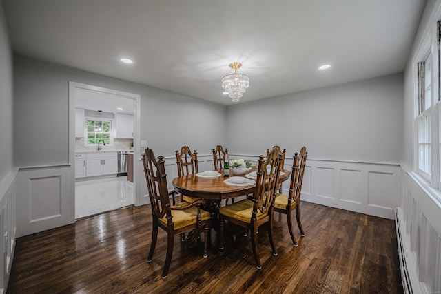 34 Roberts Rd, Marlborough, CT 06447 - dining space featuring a baseboard radiator, dark wood-style flooring, wainscoting, a chandelier, and recessed lighting