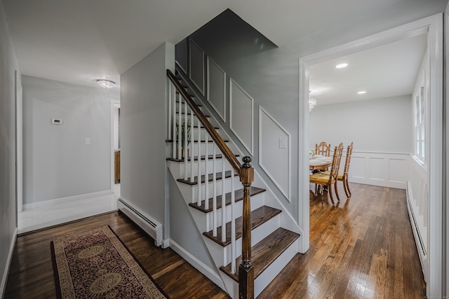 34 Roberts Rd, Marlborough, CT 06447 - stairway with a baseboard heating unit, wood finished floors, a wainscoted wall, and recessed lighting