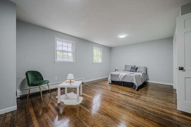 34 Roberts Rd, Marlborough, CT 06447 - bedroom with a baseboard heating unit and wood finished floors