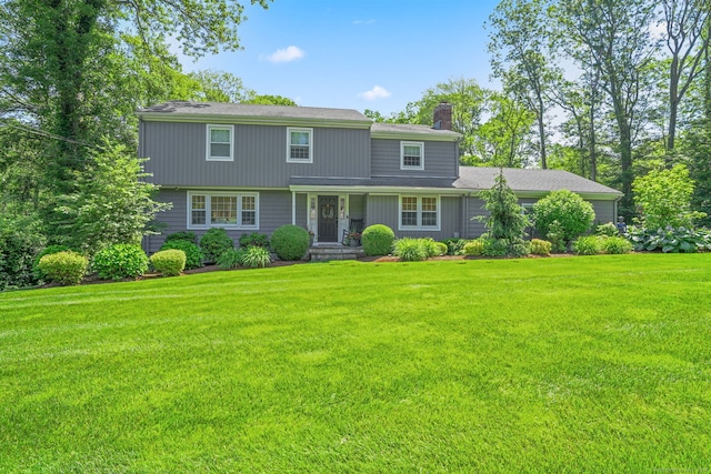 112 Greenbrier Rd, Trumbull, CT 06611 - view of front of property featuring a chimney and a front yard