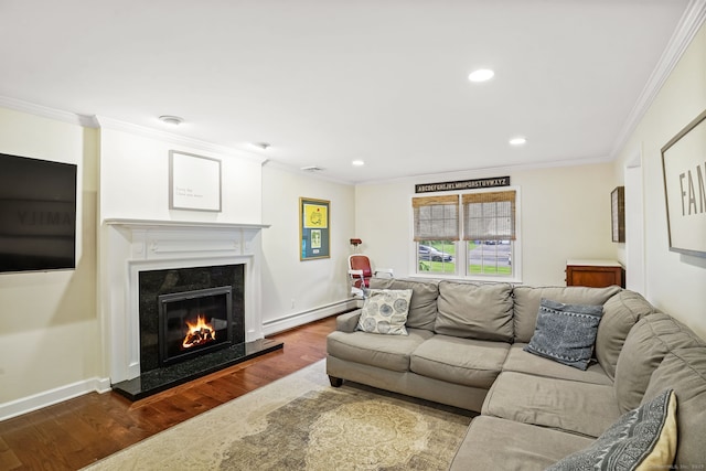 112 Greenbrier Rd, Trumbull, CT 06611 - living room with a baseboard heating unit, dark wood-type flooring, crown molding, a premium fireplace, and recessed lighting