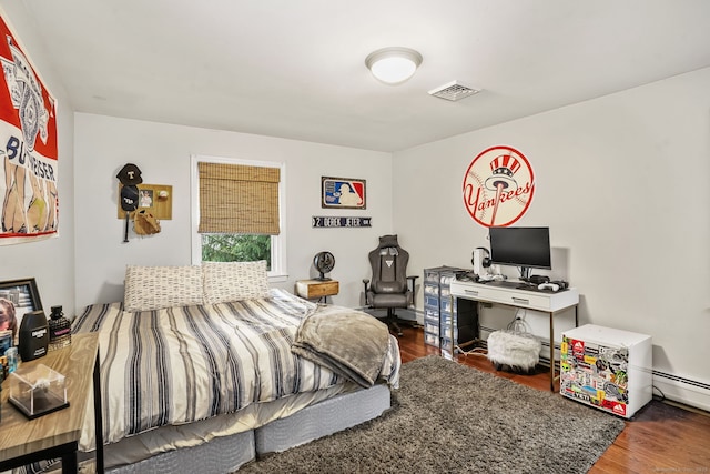 112 Greenbrier Rd, Trumbull, CT 06611 - bedroom with wood finished floors and baseboard heating