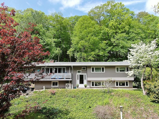 204 W Hill Rd, New Hartford, CT 06057 - bi-level home featuring entry steps, a chimney, and a balcony