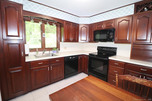 204 W Hill Rd, New Hartford, CT 06057 - kitchen with black appliances, wallpapered walls, light tile patterned floors, and light countertops