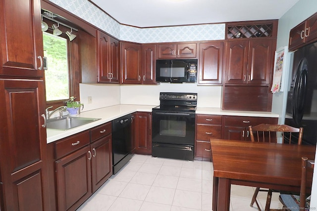 204 W Hill Rd, New Hartford, CT 06057 - kitchen with black appliances, light countertops, and light tile patterned floors