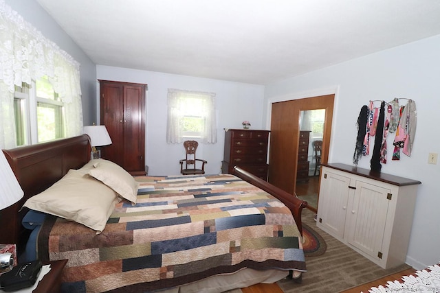 204 W Hill Rd, New Hartford, CT 06057 - bedroom with multiple windows and wood finished floors