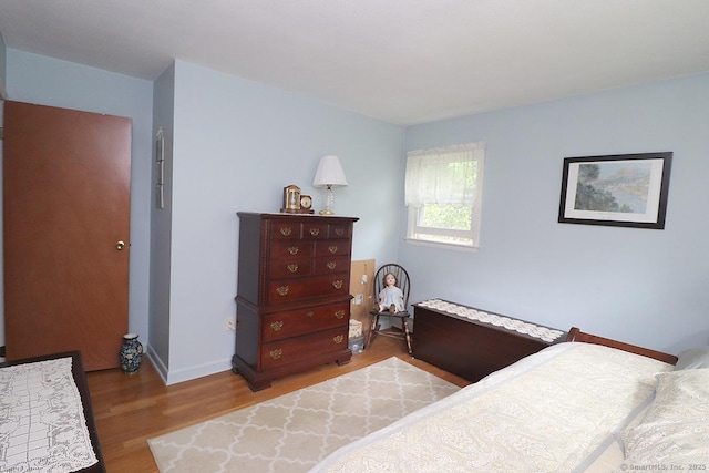 204 W Hill Rd, New Hartford, CT 06057 - bedroom featuring wood finished floors and baseboards