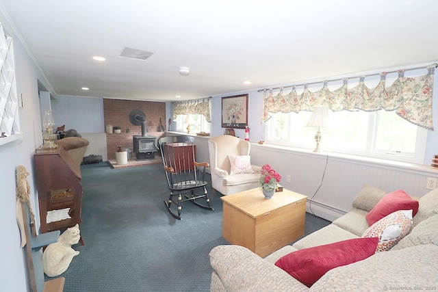 204 W Hill Rd, New Hartford, CT 06057 - living area with a wood stove, a baseboard heating unit, carpet, recessed lighting, and ornamental molding