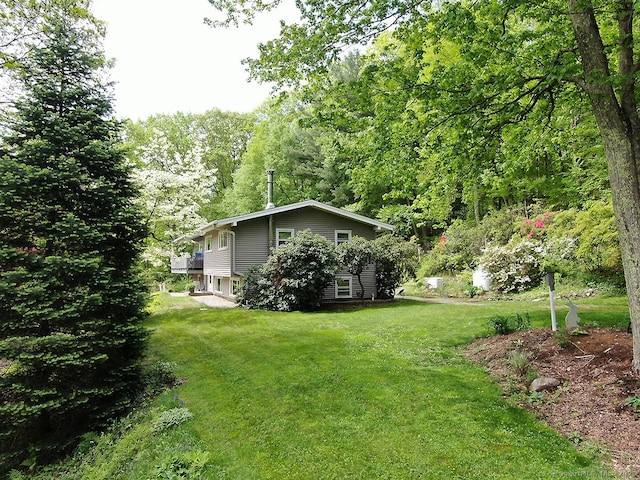 204 W Hill Rd, New Hartford, CT 06057 - view of grassy yard featuring a forest view