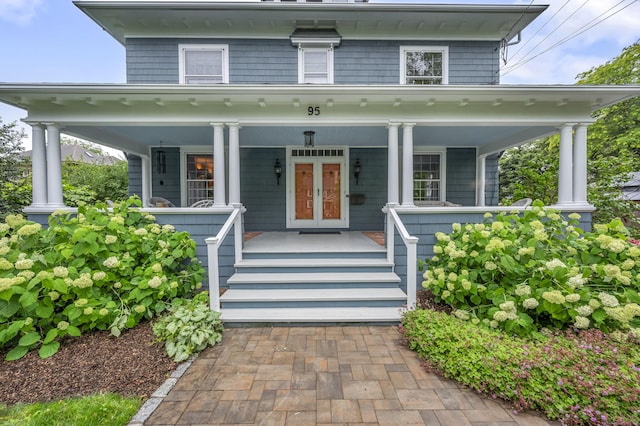 95 Parsons St, Wallingford, CT 06492 - american foursquare style home featuring a porch and french doors