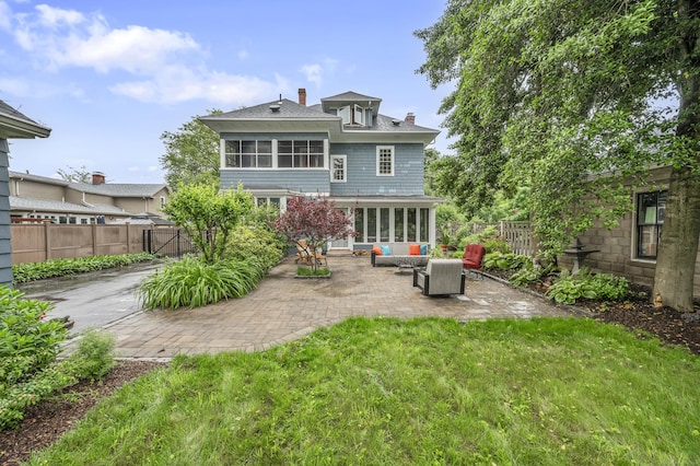 95 Parsons St, Wallingford, CT 06492 - back of house with a patio area, a sunroom, a chimney, and a fenced backyard