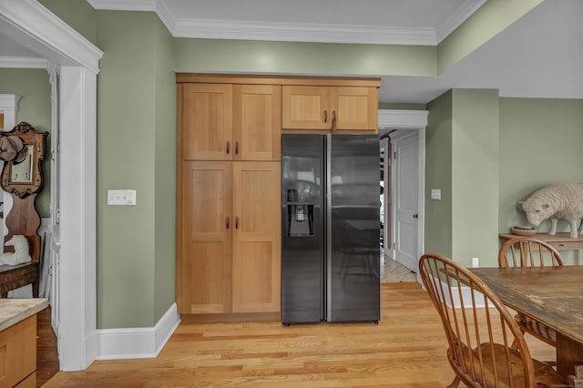 95 Parsons St, Wallingford, CT 06492 - kitchen with refrigerator with ice dispenser, light wood-type flooring, crown molding, light brown cabinetry, and light countertops
