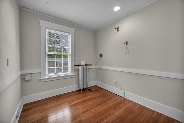 95 Parsons St, Wallingford, CT 06492 - unfurnished room featuring radiator, ornamental molding, hardwood / wood-style flooring, and recessed lighting