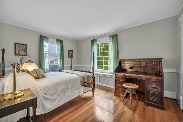 95 Parsons St, Wallingford, CT 06492 - bedroom featuring hardwood / wood-style flooring, ornamental molding, and radiator