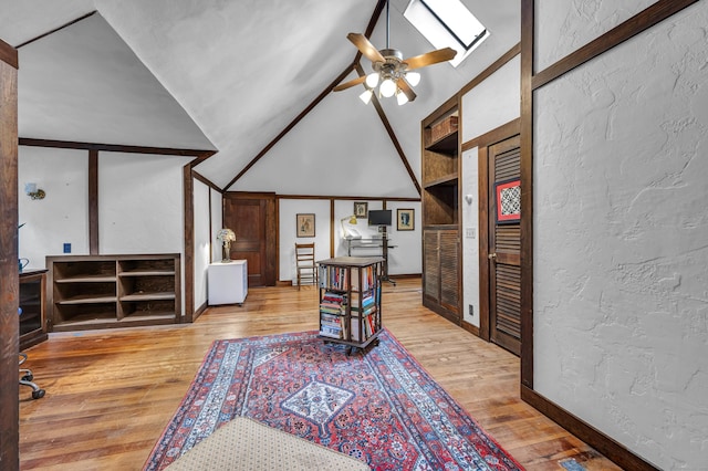 95 Parsons St, Wallingford, CT 06492 - sitting room with a textured wall, light wood-type flooring, ceiling fan, and vaulted ceiling