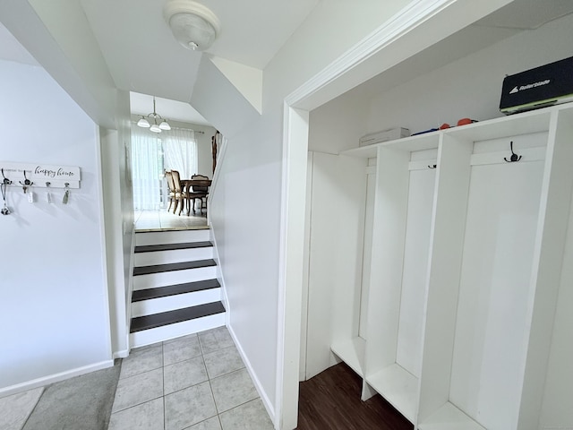 333 Vincellette St Unit 114, Bridgeport, CT 06606 - mudroom featuring a chandelier and light tile patterned floors