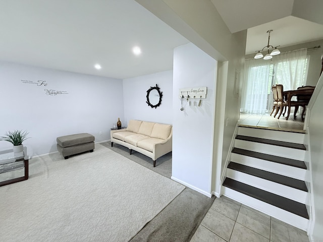 333 Vincellette St Unit 114, Bridgeport, CT 06606 - tiled living room with carpet floors, a chandelier, and recessed lighting