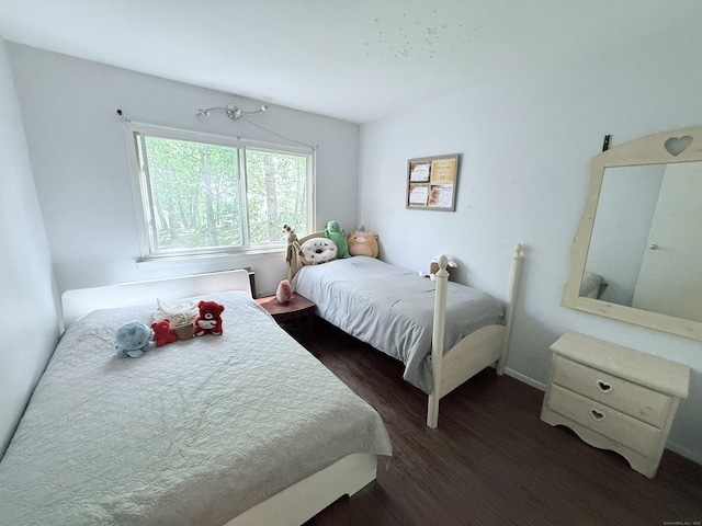 333 Vincellette St Unit 114, Bridgeport, CT 06606 - bedroom with dark wood finished floors and baseboards