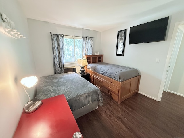 333 Vincellette St Unit 114, Bridgeport, CT 06606 - bedroom with dark wood-style flooring and baseboards