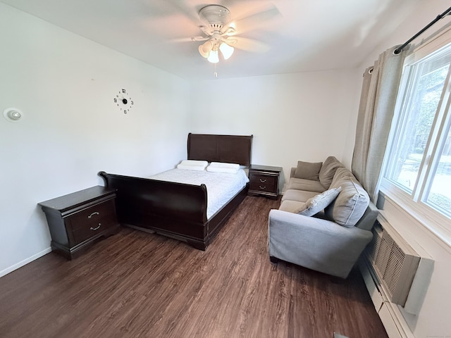 333 Vincellette St Unit 114, Bridgeport, CT 06606 - bedroom featuring multiple windows, dark wood-style flooring, and a ceiling fan